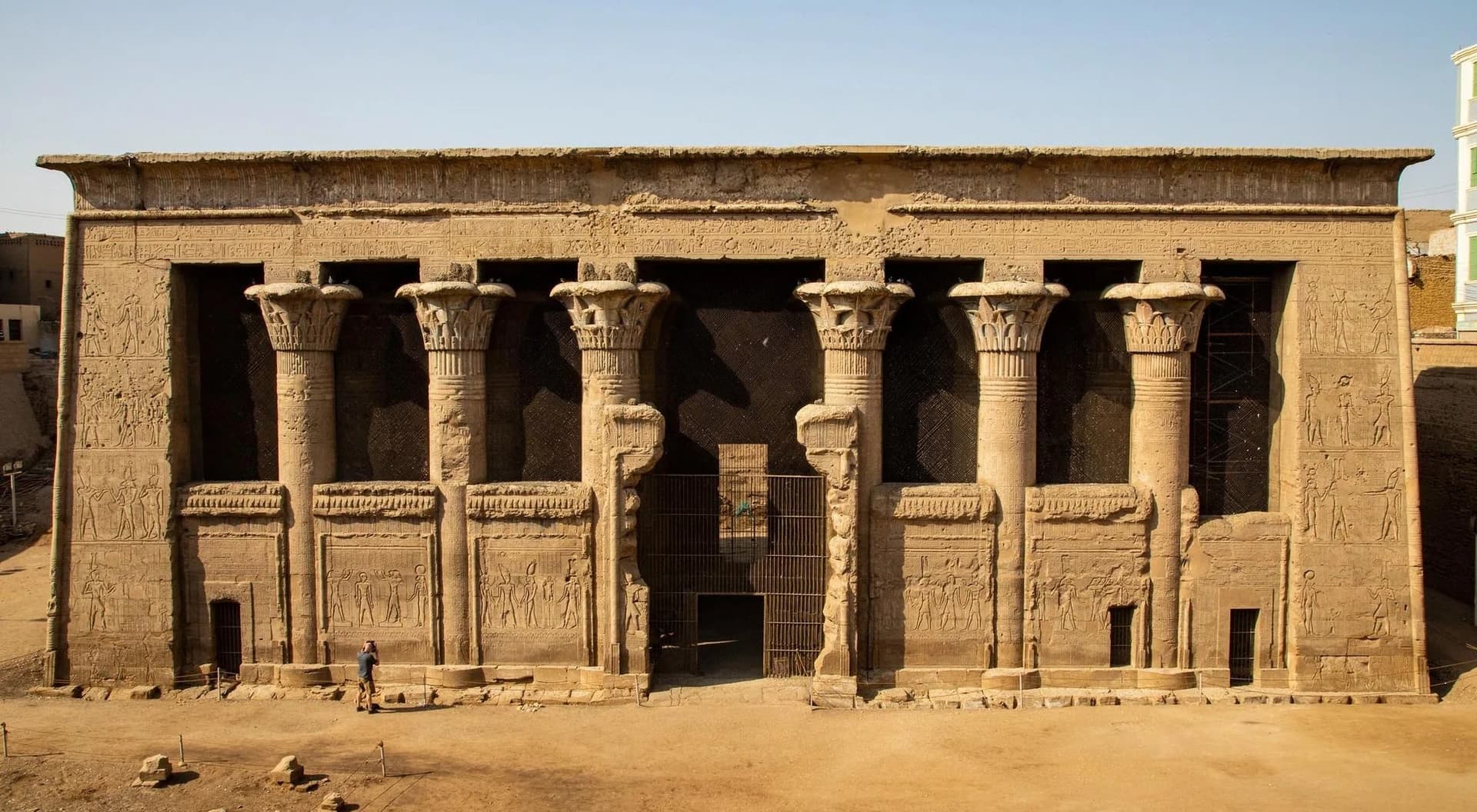 The screen wall and composite columns of the Temple of Khnum at Esna, standing in a pit below the level of the modern town