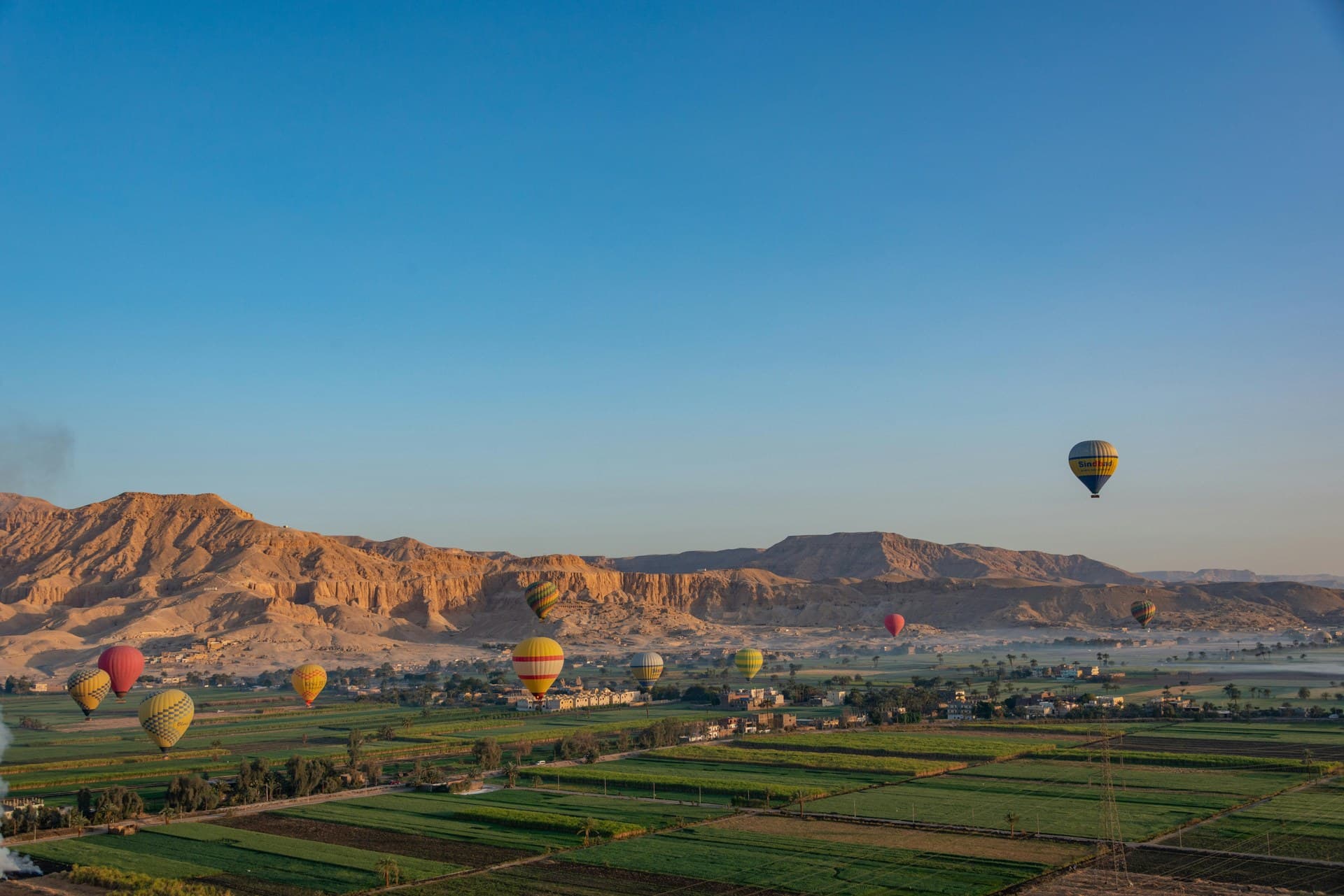 Hot air balloons over the west bank at Luxor shortly after sunrise